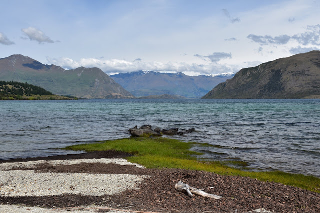 Lake, mountains, sky, stripe of green