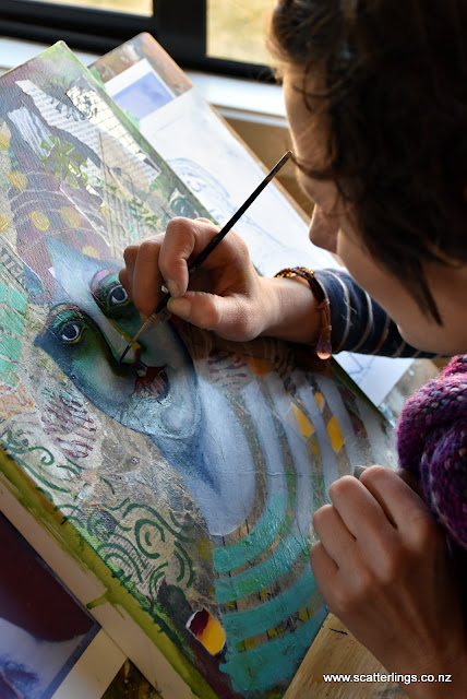 Heidi adding tiny details to the underpainting