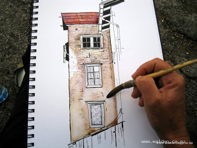 Painting the wall in watercolour and large brush, wet in wet, 3 or 4 colours