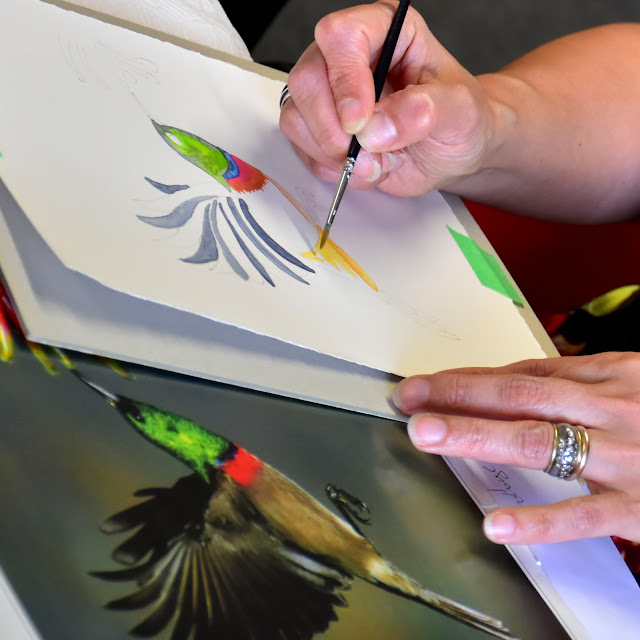 Adding details with a tiny brush