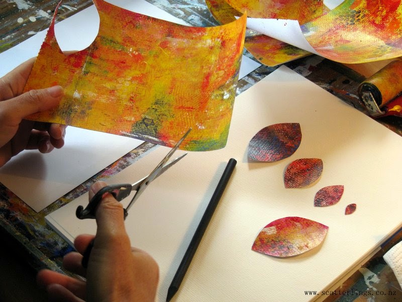 Collaging with hand painted papers