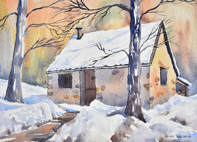 a snowy mountain hut